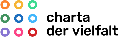 Logo der Initiative Charta der Vielfalt mit bunten Kreisen auf schwarzem Grund.